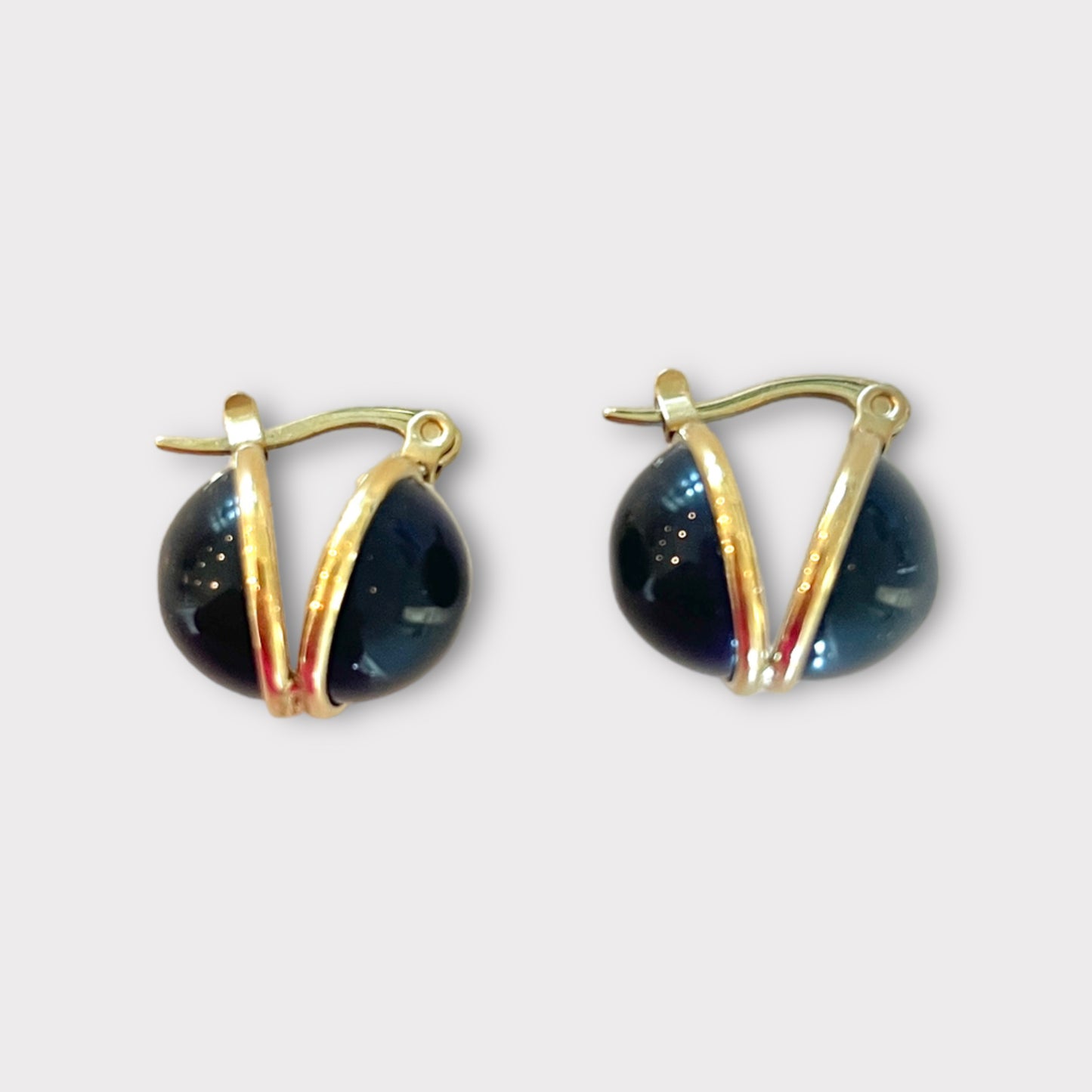 Navy enamel huggie earrings